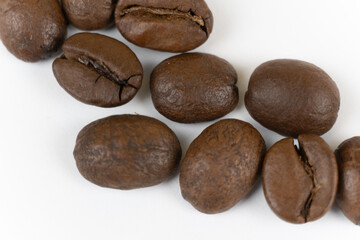 Large coffee beans isolated on a white background close-up