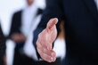 © H_Ko - Businesswoman offer hand to shake as hello in office closeup