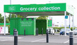 Click collect online internet shopping sign at shop car park