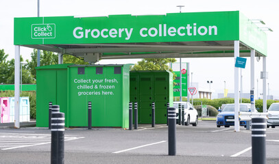 Click collect online internet shopping sign at shop car park