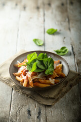 Wall Mural - Pasta with tomato sauce and fresh spinach