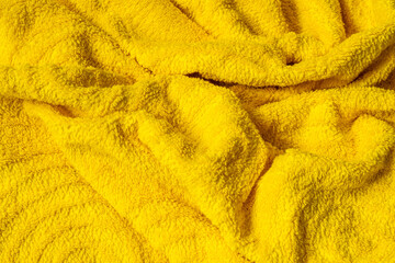 Poster - pleated yellow cotton material. texture or background