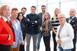 © ASDF - Smiling and confident business team standing together