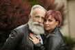© lashkhidzetim - Portrait of beautiful caucasian senior couple posing outdoor.