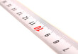 © SERGEJ - fragment of measuring tape on a white background