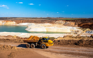 Wall Mural - Big truck works at quartz sand quarry