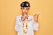 © Krakenimages.com - Young beautiful african american afro hippie woman wearing sunglasses and accessories asking to be quiet with finger on lips pointing with hand to the side. Silence and secret concept.