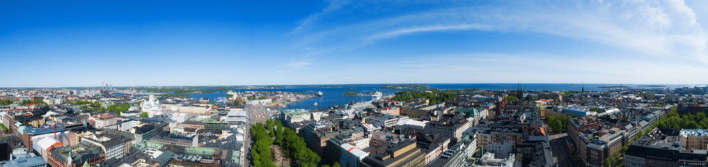 Wall Mural - Helsinki panoramic aerial view in summer time. Esplanadi park and cathedral at the Old Town in Helsinki. Blue sky. City center aerial view. Finland