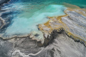 Industrial coal mine, abstract sendimentation tank of power plant , turquoise water like river delta