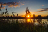 Fototapeta  - Beautiful sunset at lake
