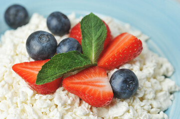 Wall Mural - quark and berries - blueberries, strawberries and mint with cottage cheese