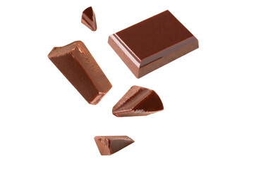 Sticker - Three dark chocolate pieces Blast pieces in the air on a white background .Clipping path