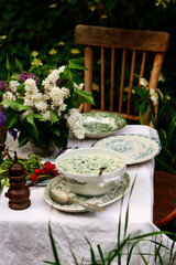 Wall Mural - okroshka, a traditional Russian cold soup on a table set