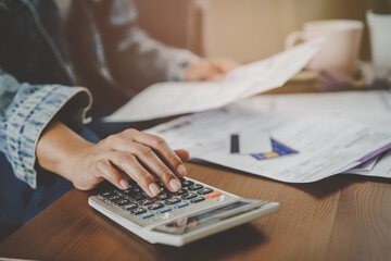 person calculate monthly expense and payment bill invoice