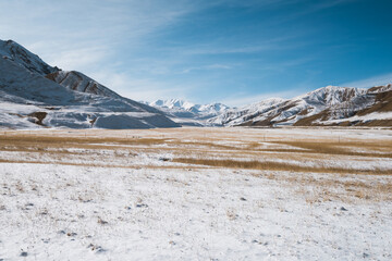 Wall Mural - lanscape with barren mountain which is covered with ice