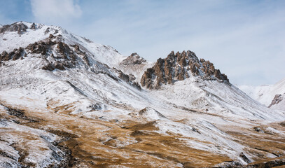 Wall Mural - lanscape with barren mountain which is covered with ice