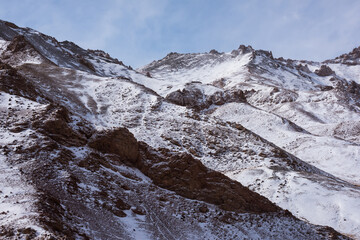 Wall Mural - lanscape with barren mountain which is covered with ice