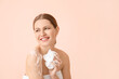 © Pixel-Shot - Beautiful young woman taking shower on color background