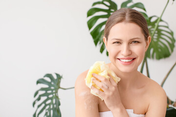 Poster - Beautiful young woman taking bath at home