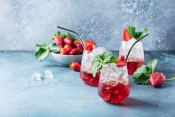 Wall Mural - Red cocktail with ice and fresh strawberry