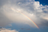 Fototapeta Tęcza - rainbow over blue sky