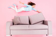 Top view above high angle flat lay flatlay lie concept of her she nice attractive pretty cheerful girl making comfy comfort apartment fixing pillow isolated on pink pastel color background