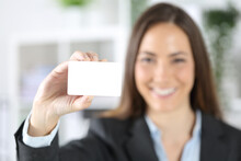 Happy Executive Shows Credit Card At The Office