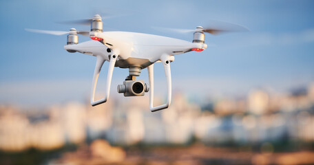 Wall Mural - drone with digital camera flying at city street