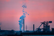 Scenic view of industrial landscape in Germany at sunset against sky.