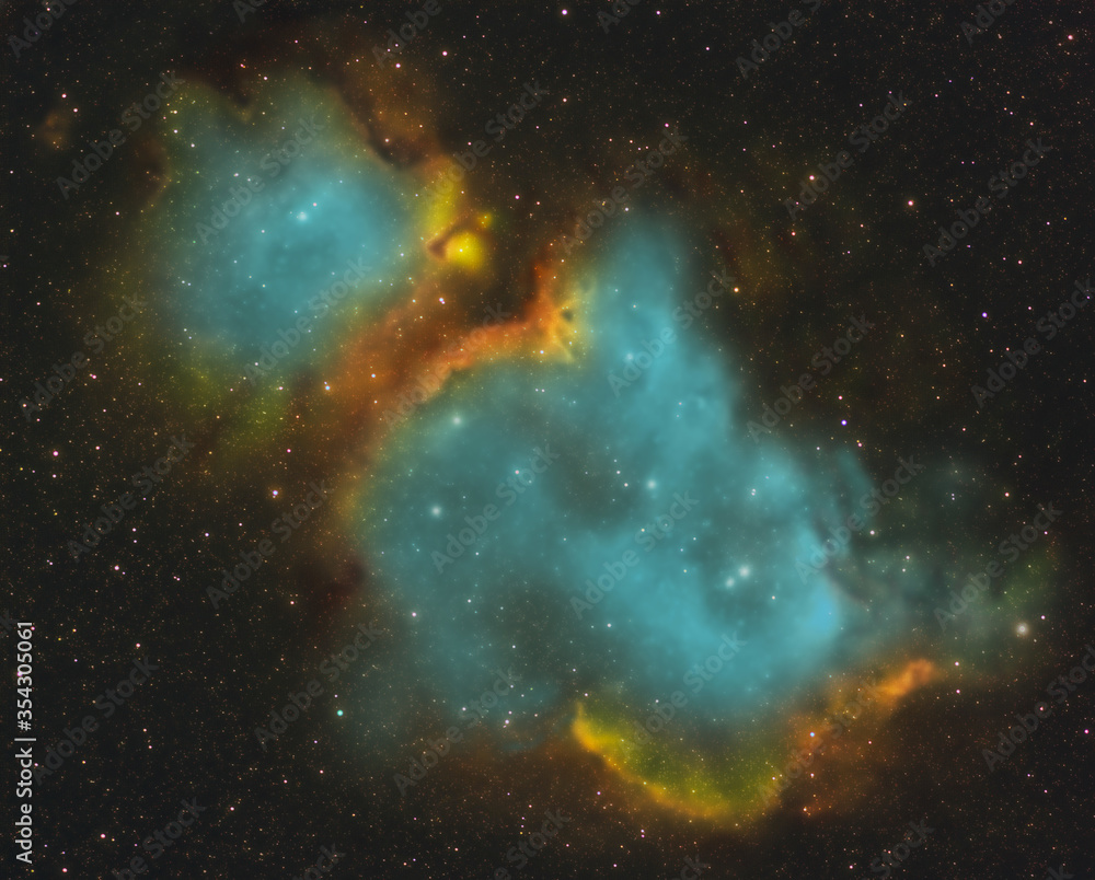 Mgławica Dusza w palecie HST. Jeden z najpiękniejszych obiektów na nocnym niebie. Mgławica wodorowa IC 1848 znajduje się w gwiazdozbiorze Kasiopei  - obrazy, fototapety, plakaty 
