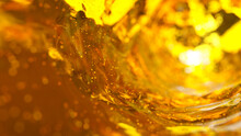 Beer With Bubbles Moves In A Glass In Slow Motion. Abstract Water Background. 3d Illustration