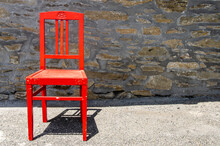 Wooden Red Chair In The Sun