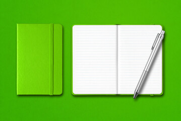 Sticker - Green closed and open notebooks with a pen isolated on colorful background