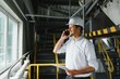 © Serhii - Portrait of an engineer talking on the phone