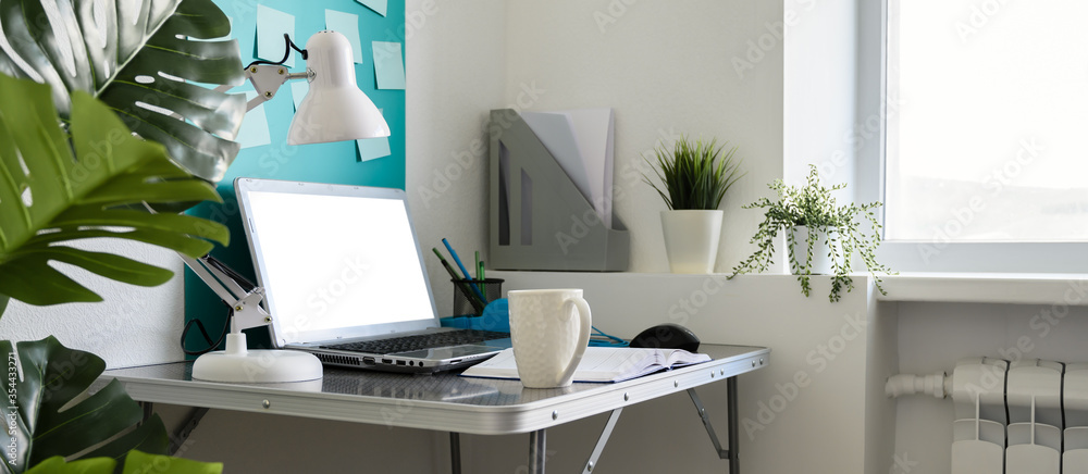 Home office workplace with laptop. Modern creative workspace at home. Banner - obrazy, fototapety, plakaty 