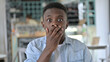 © stockbakers - Portrait of Worried Young African Man in Shock