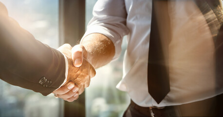 businessman handshake for teamwork of business merger and acquisition