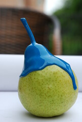 pear in blue paint