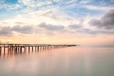 Fototapeta Morze - Wooden bridge sunrise view for beautiful background