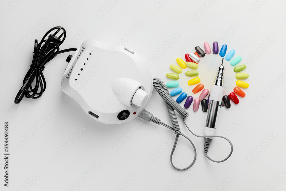 Supplies for manicure on white background