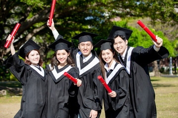 group happy graduates students