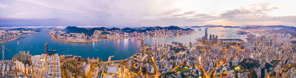 Epic aerial view of Victoria Harbour, Hong Kong, Twilight metropolis, panorama - obrazy, fototapety, plakaty 
