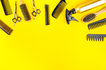 Poster - Hairdresser set in beauty salon. Combs, scissors, spray on yellow desk top-down copy space