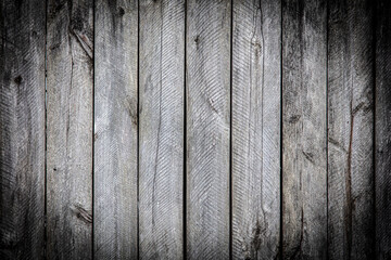 Wooden boards on an old fence as an abstract background.