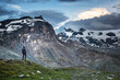 © Bikej Barakus - Tourist in Alps standing in the valley. Klein Matterhornand Furggen in the background.