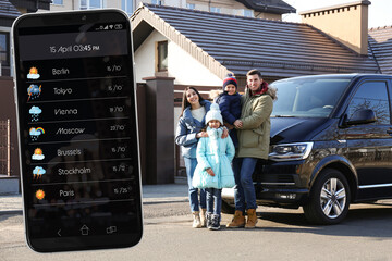 Wall Mural - happy family near modern car outdoors and smartphone with open weather forecast app