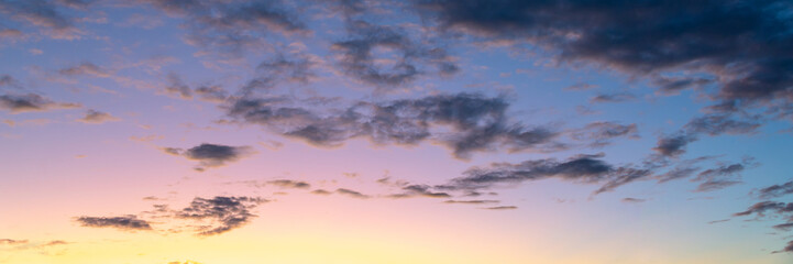 Wall Mural - colorful sky with clouds at sunset, nature panoramic background