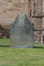 Weathered Gravestone In Hinckley Churchyard. Headstone In A Church Graveyard