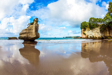 Canvas Print -  Coastal cliffs reflected in the water