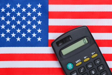 Calculator with flag of the United States of America.